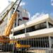 Reinstalan camioneta roja en edificio Santo Domingo Motors